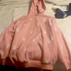 Pink hoodie with Playboy bunny on it. Size 8